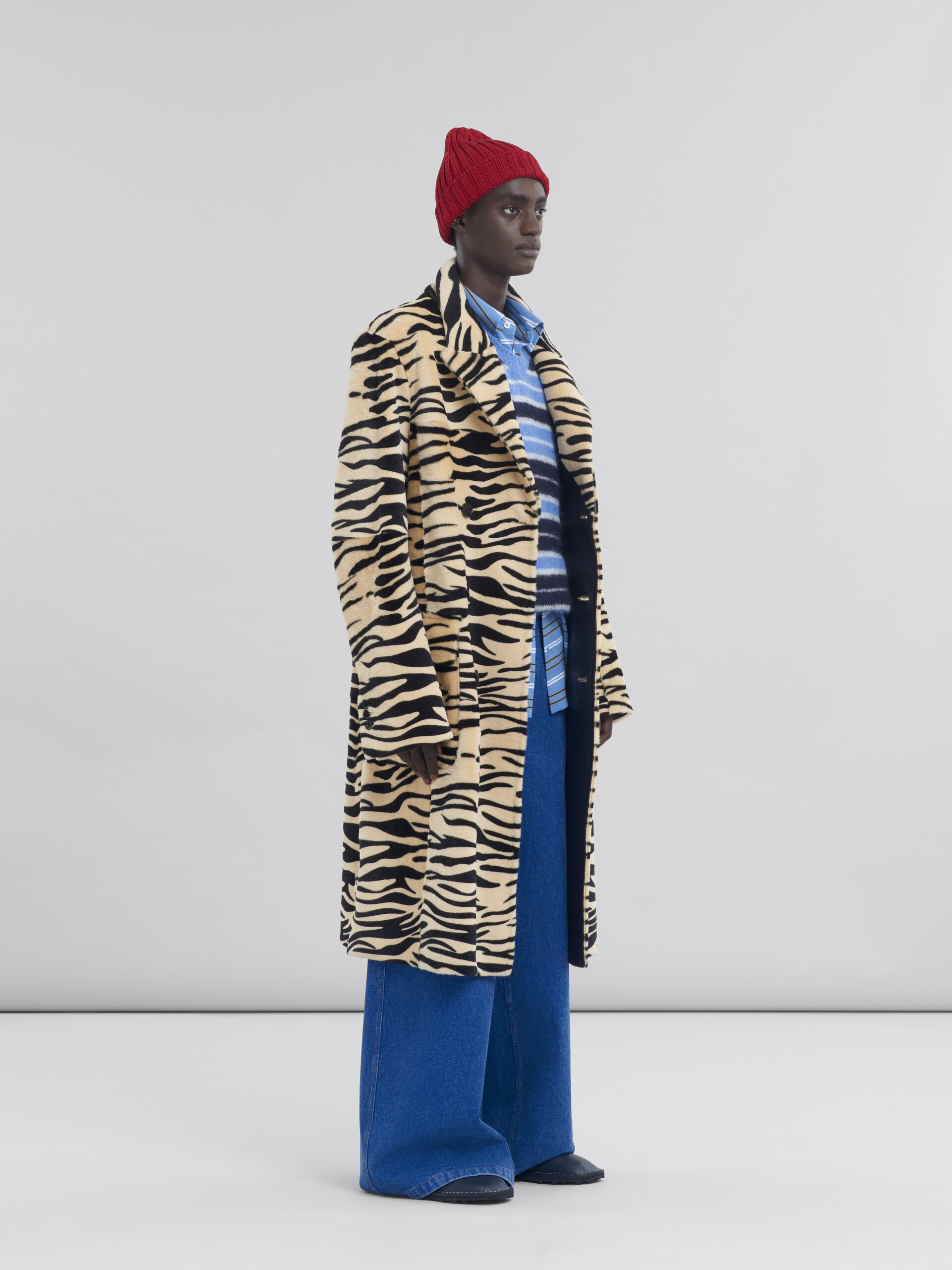 Look with tiger print shearling coat