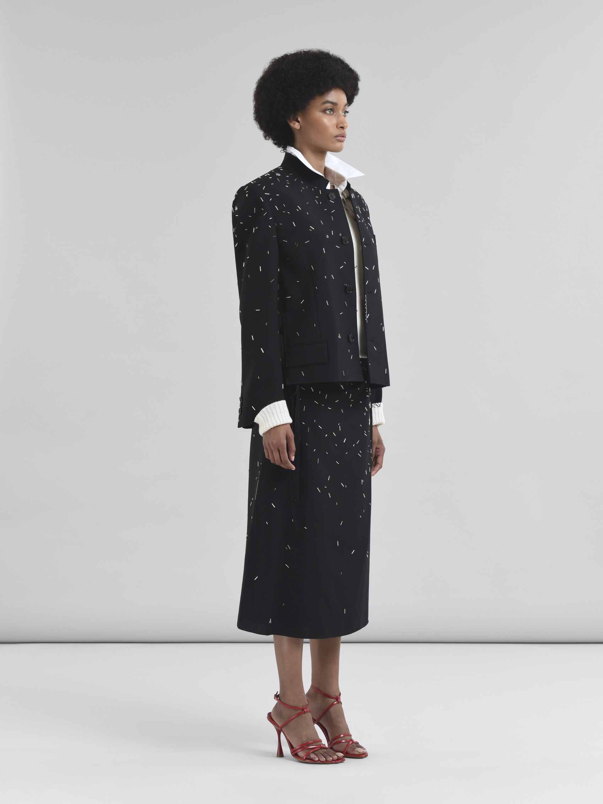 Black wool set with embroidered bead detail