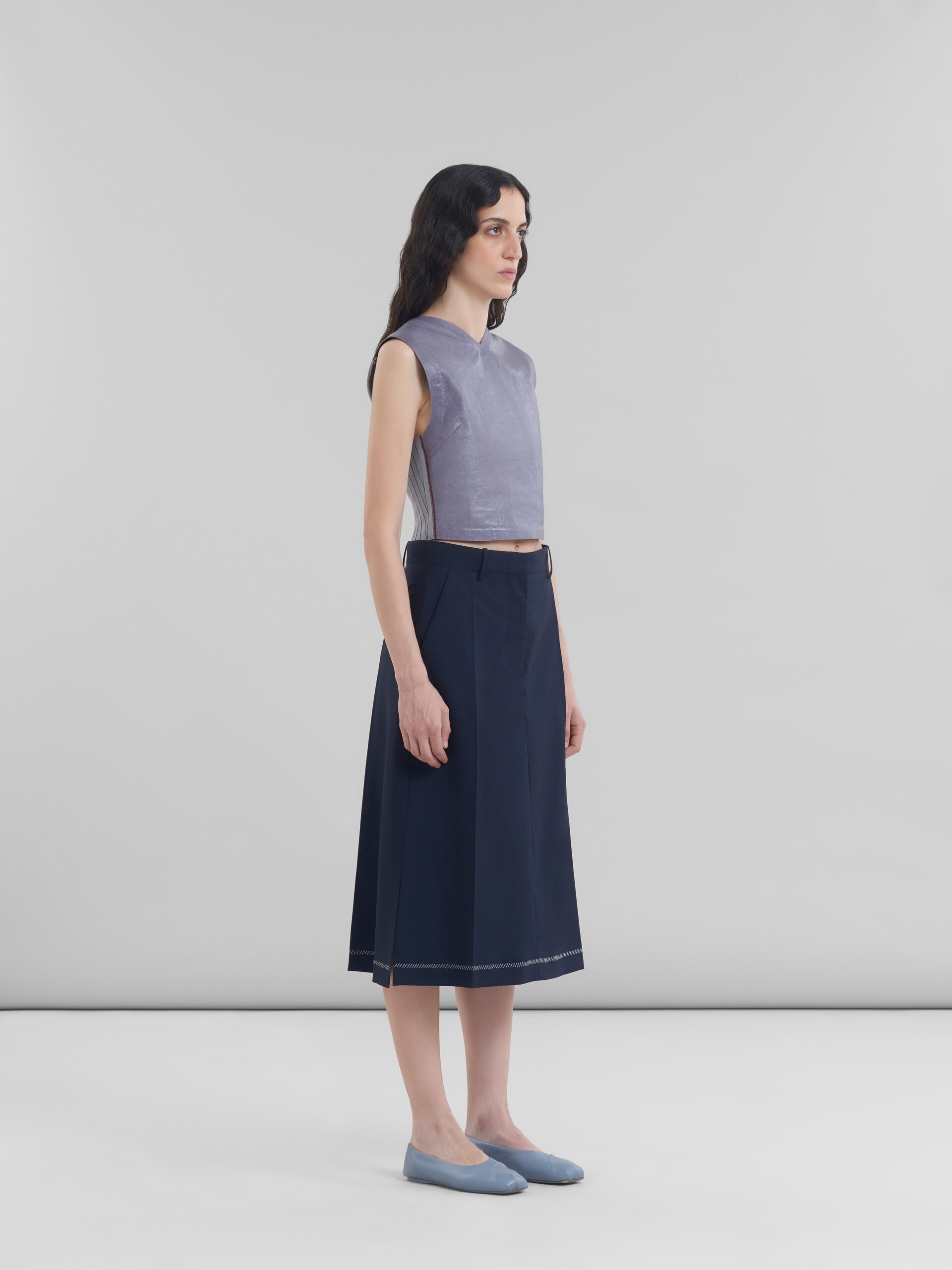 Deep blue wool midi skirt with pressed pleats