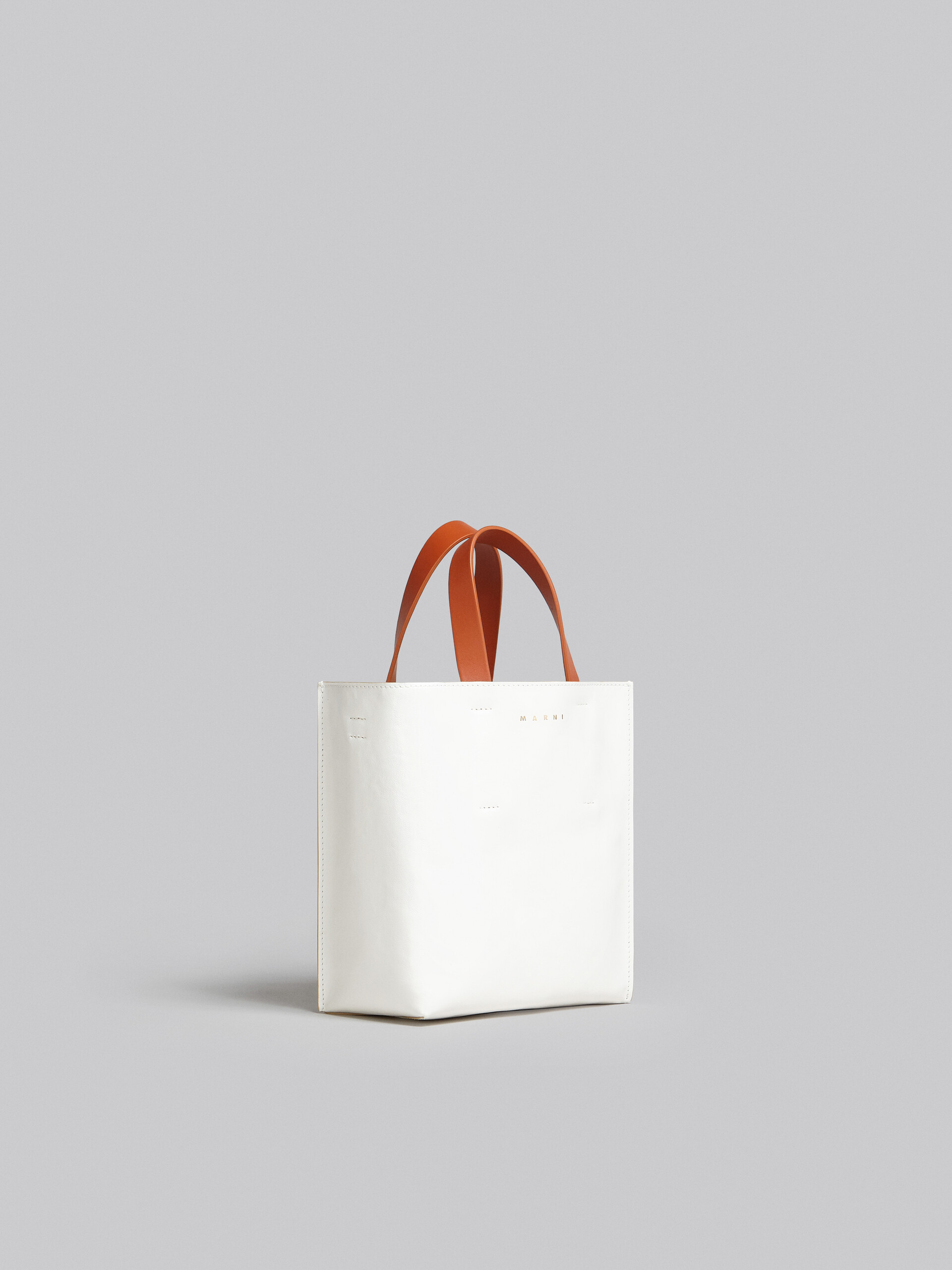 Museo Soft Mini Bag in white light blue and orange leather