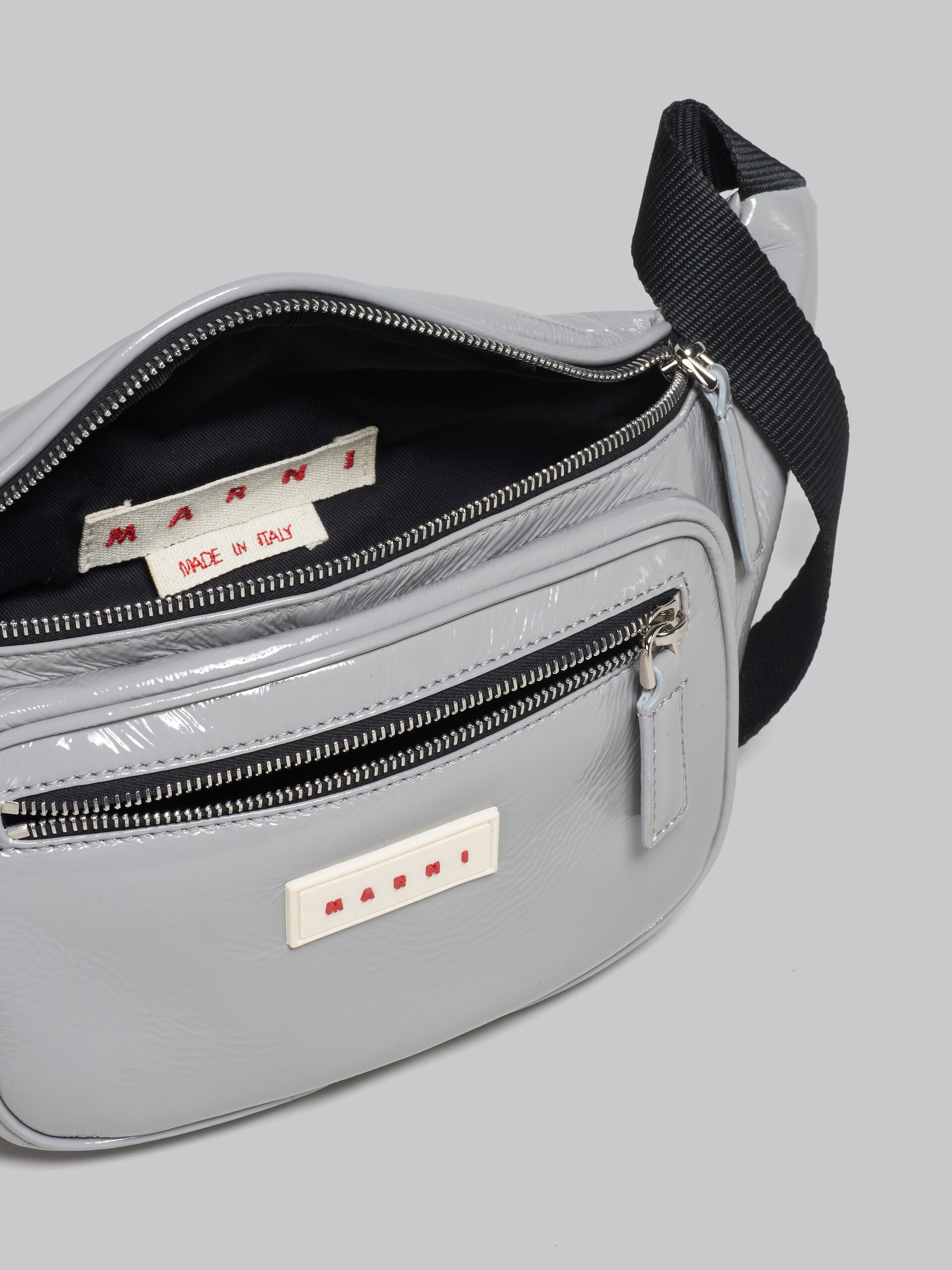 Grey patent belt bag