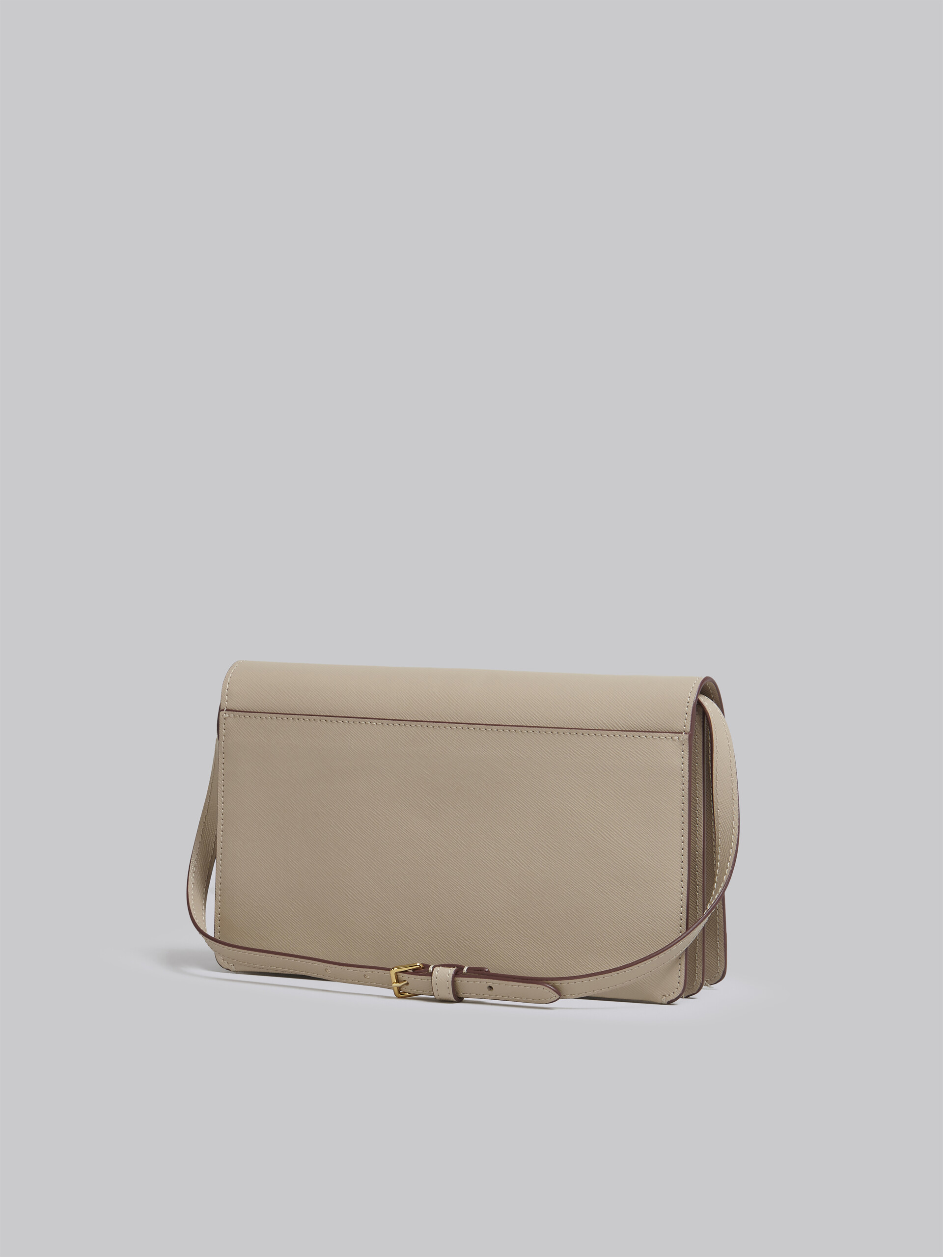 TRUNK clutch bag in beige saffiano leather