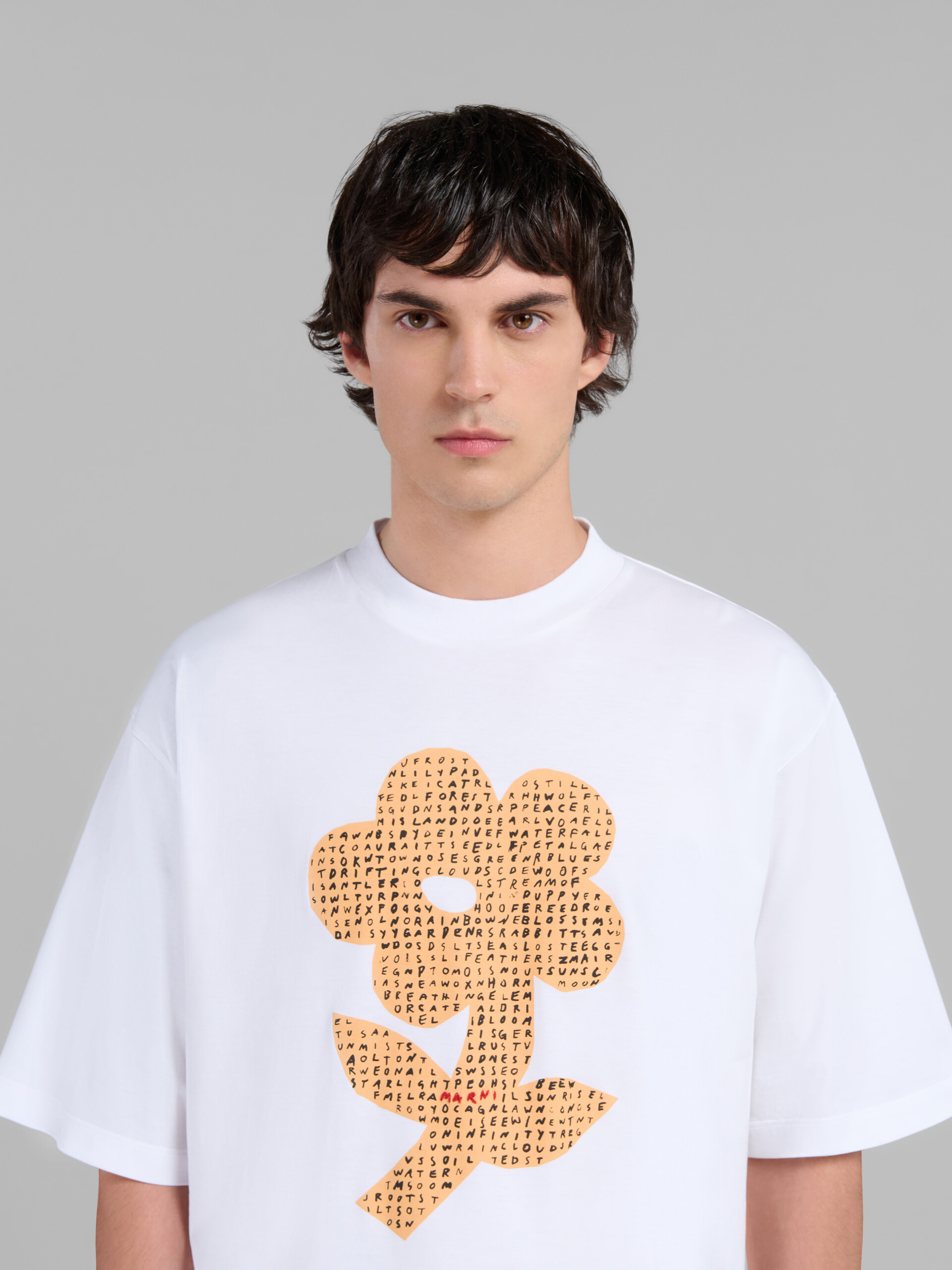 White organic cotton T-shirt with wordsearch flower print